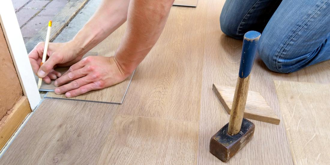 Contractor installs new flooring