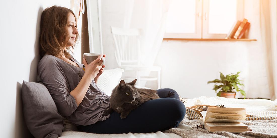Peaceful woman with cat